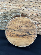 Load image into Gallery viewer, The Handmade Miniature Nativity Set by Her Best Foot Forward, fair wage Christmas decor from Tanzania, features rustic wood and a woven wicker backdrop, highlighting the beauty of African craftsmanship.